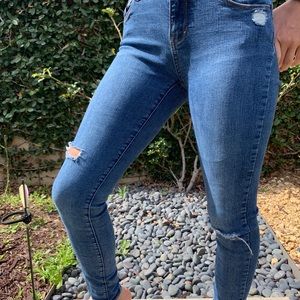 blue wash ripped skinny jeans